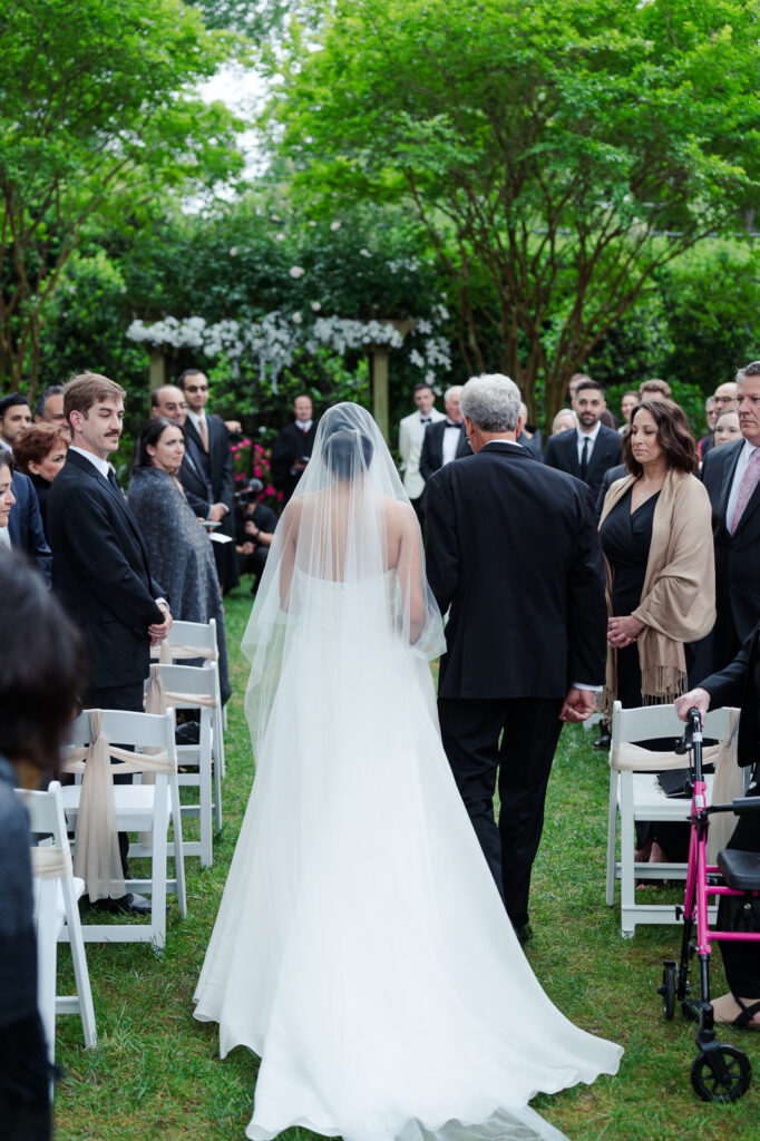 Bride walking down the aisle with father